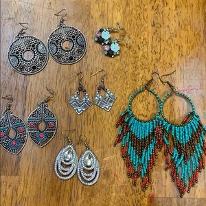 Six pairs of paparazzi earrings. Never worn